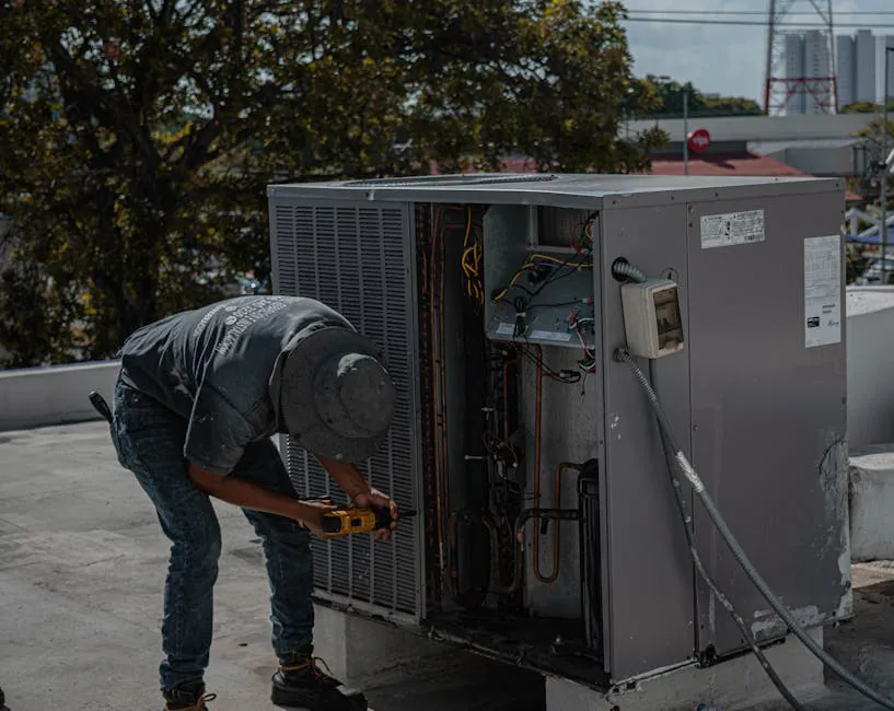 Expert HVAC technician performing professional new air conditioning system installation