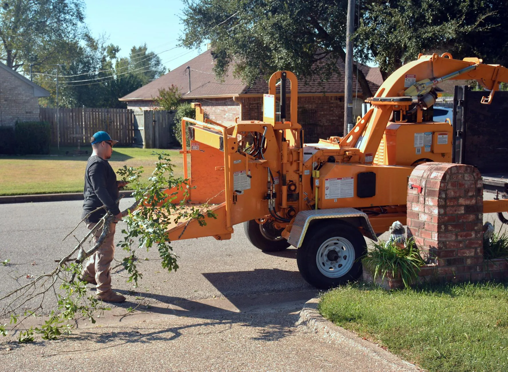 Green Horizons landscaping crew working on residential property