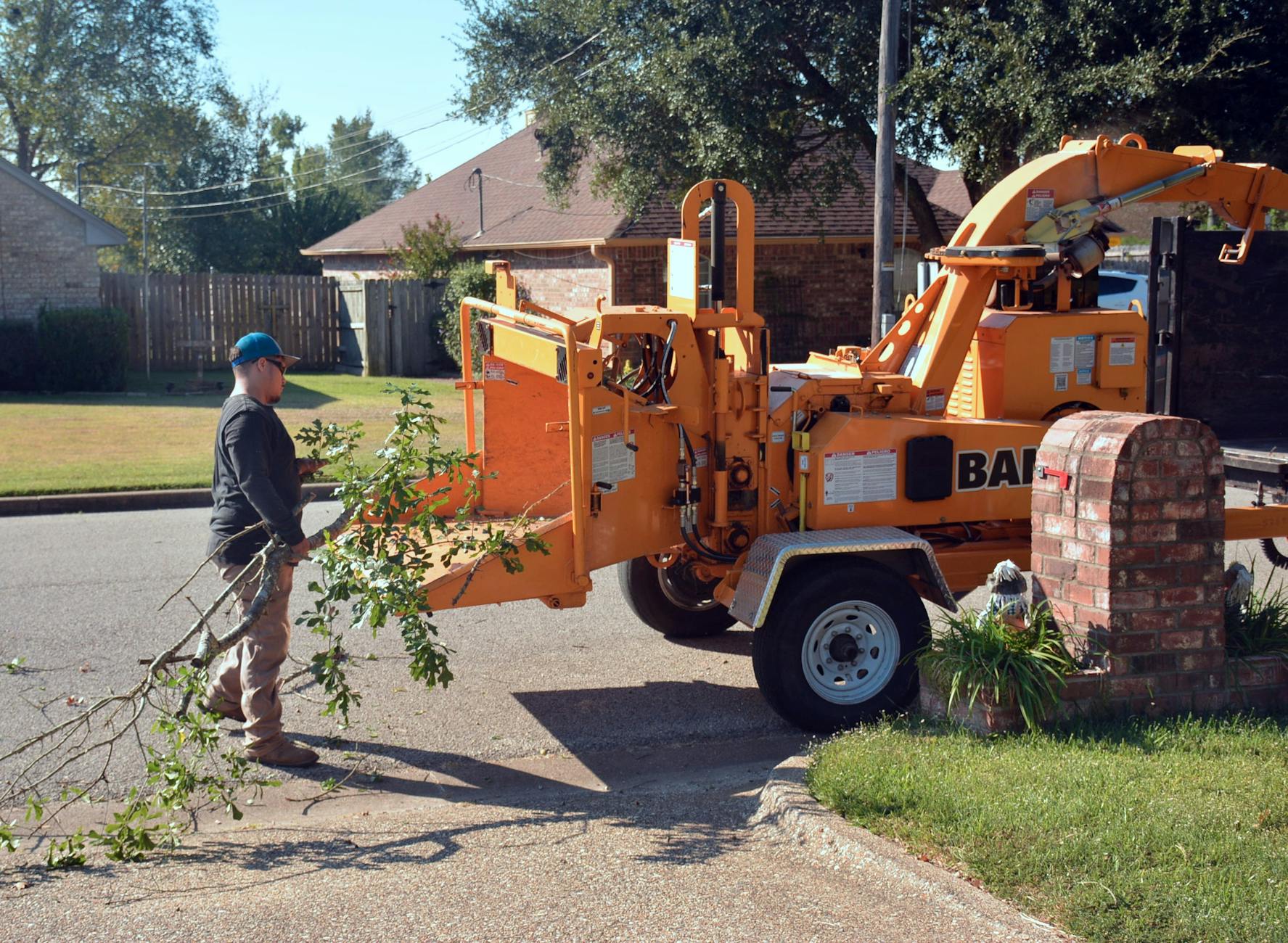 Green Horizons landscaping crew working on residential property
