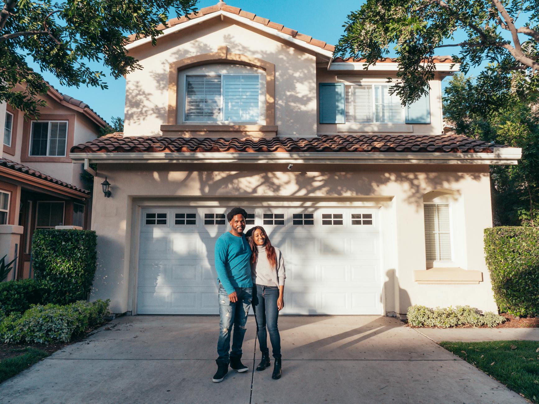 Satisfied Austin homeowner enjoying their landscaped yard
